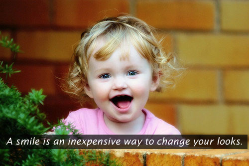 A smile is an inexpensive way to change Smile Quotes Image
