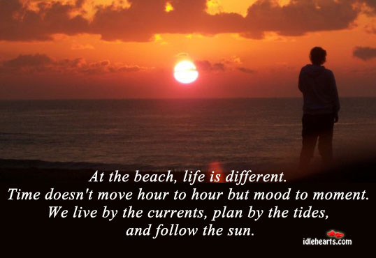 At the beach, life is different. Life Quotes Image