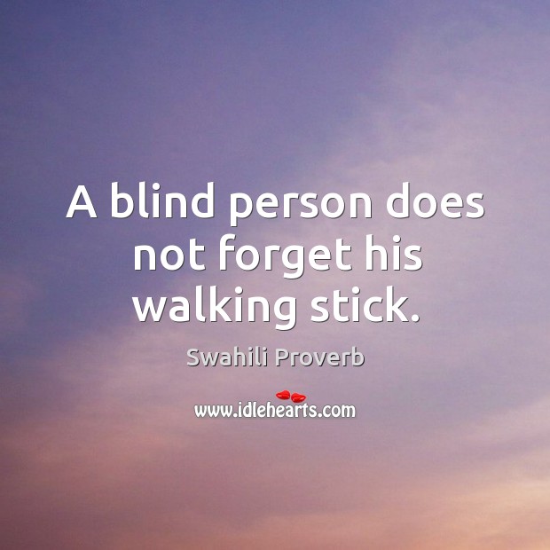 A blind person does not forget his walking stick. Image