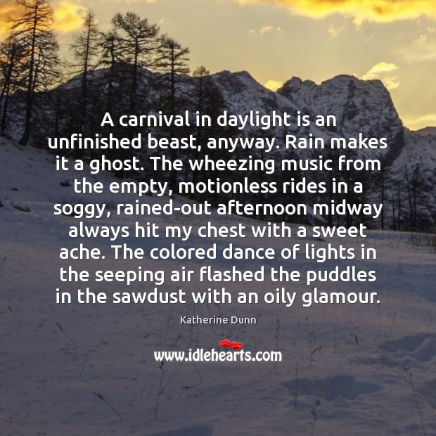 A carnival in daylight is an unfinished beast, anyway. Rain makes it 