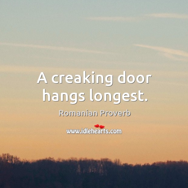 A creaking door hangs longest. Romanian Proverbs Image