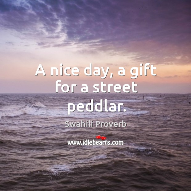 A nice day, a gift for a street peddlar. Image