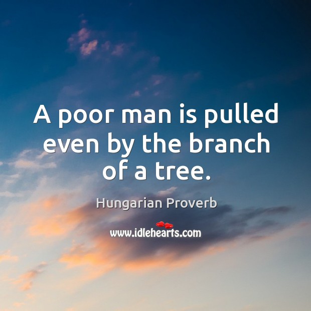 A poor man is pulled even by the branch of a tree. Image