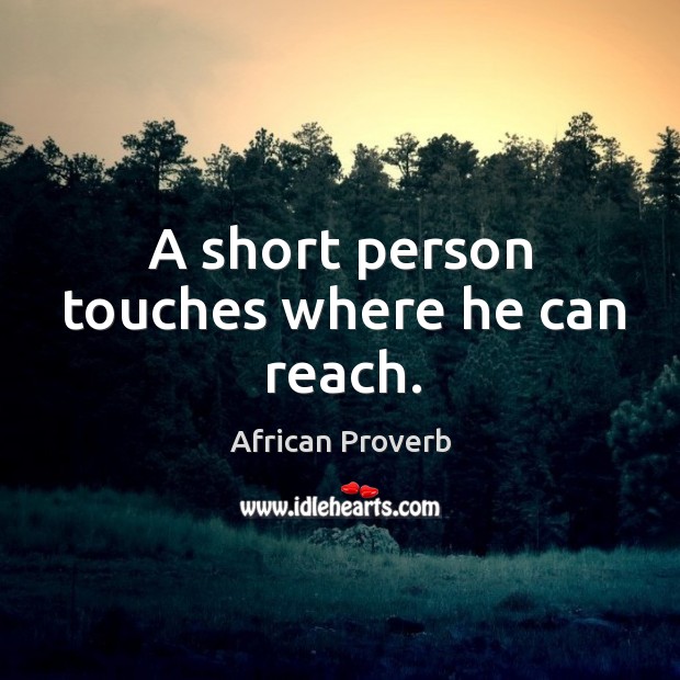 A short person touches where he can reach. Image