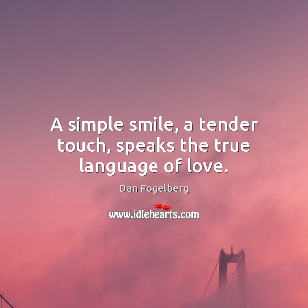 A simple smile, a tender touch, speaks the true language of love. Image