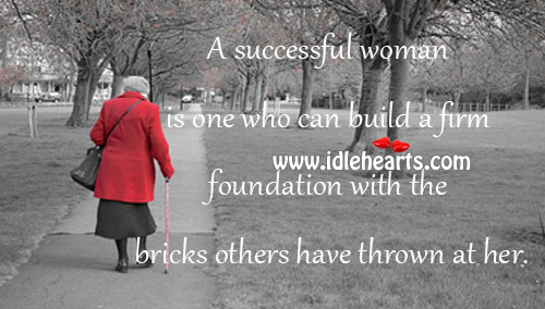 A successful woman is one who can build Women Quotes Image
