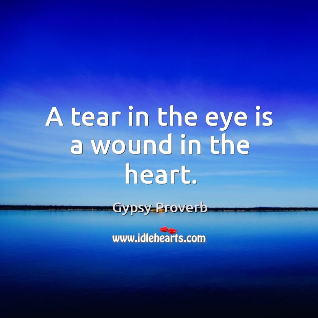 A tear in the eye is a wound in the heart. Gypsy Proverbs Image