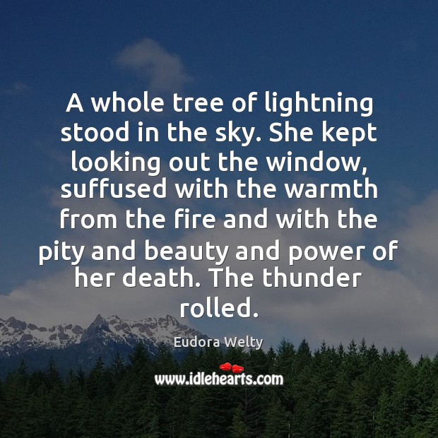 A whole tree of lightning stood in the sky. She kept looking Image