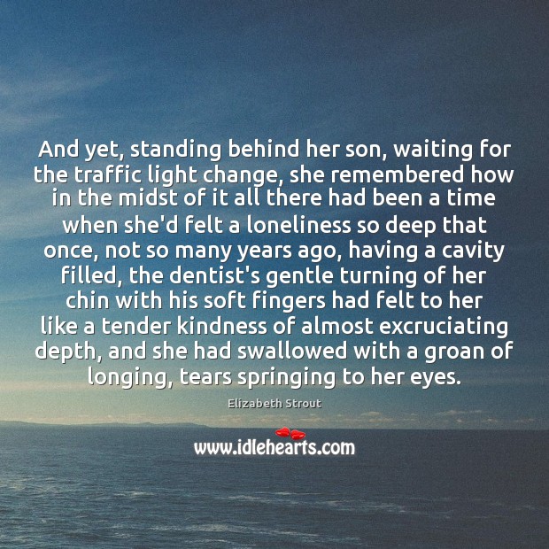 And yet, standing behind her son, waiting for the traffic light change, Image