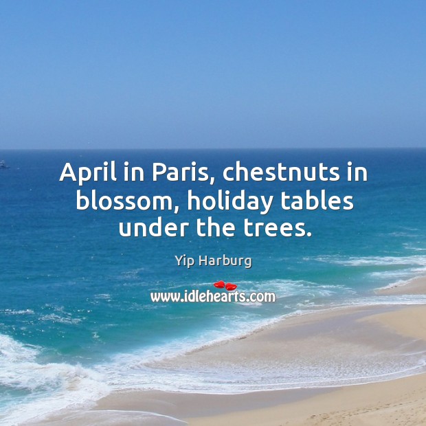 April in paris, chestnuts in blossom, holiday tables under the trees. Image