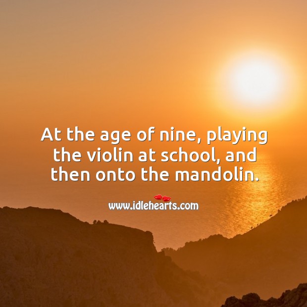 At the age of nine, playing the violin at school, and then onto the mandolin. Image