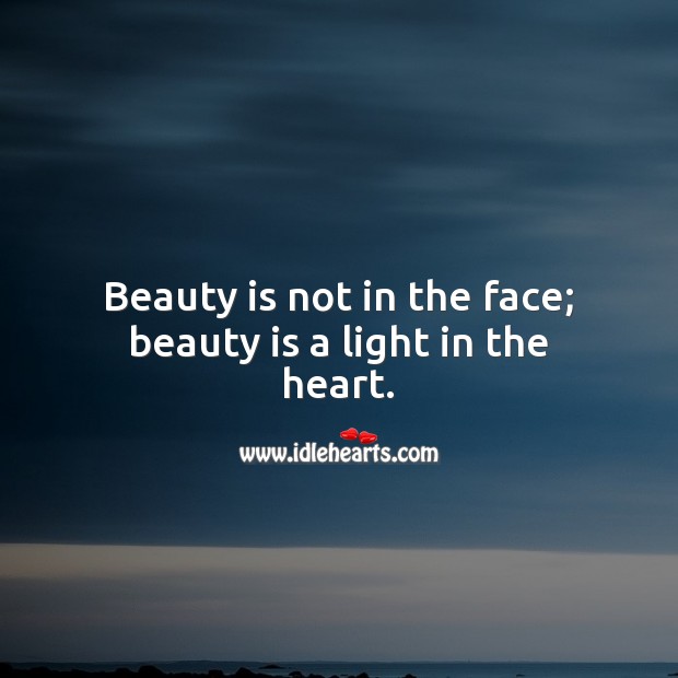 Beauty is not in the face; beauty is a light in the heart. Inspirational Love Quotes Image