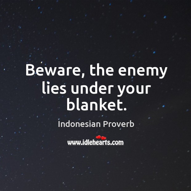 Beware, the enemy lies under your blanket. Indonesian Proverbs Image