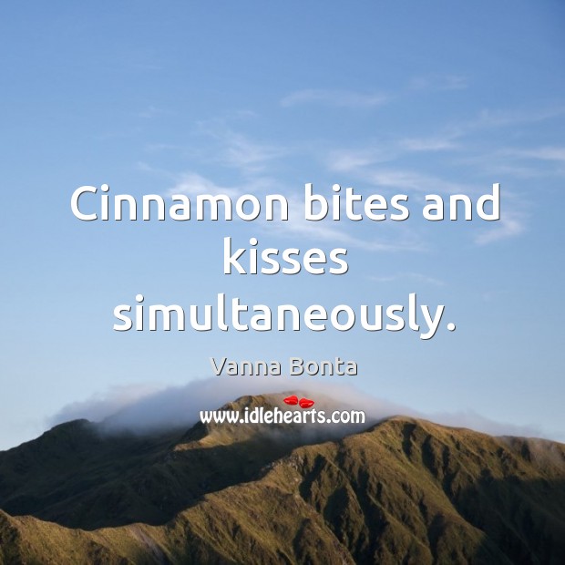 Cinnamon bites and kisses simultaneously. Image