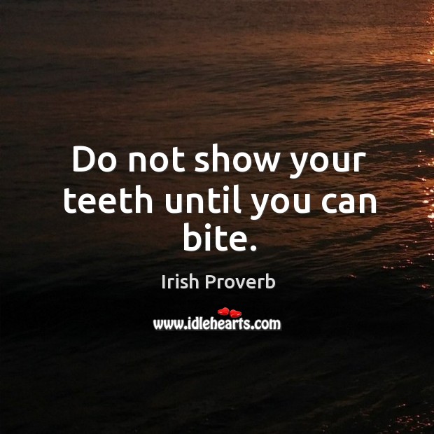 Do not show your teeth until you can bite. Image