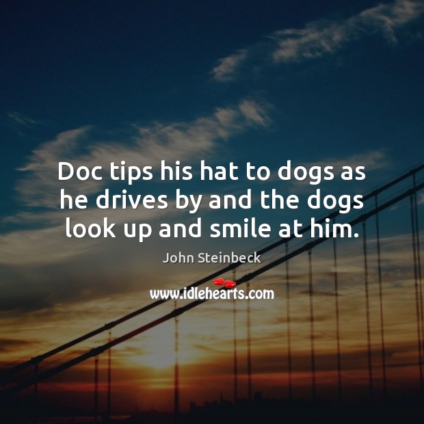 Doc tips his hat to dogs as he drives by and the dogs look up and smile at him. Image