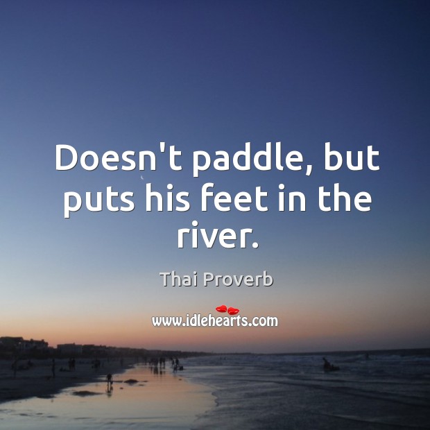 Doesn’t paddle, but puts his feet in the river. Thai Proverbs Image