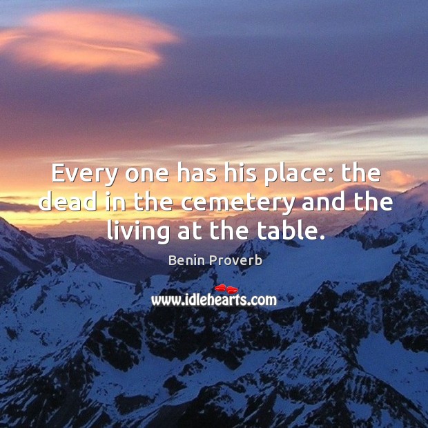 Every one has his place: the dead in the cemetery and the living at the table. Image