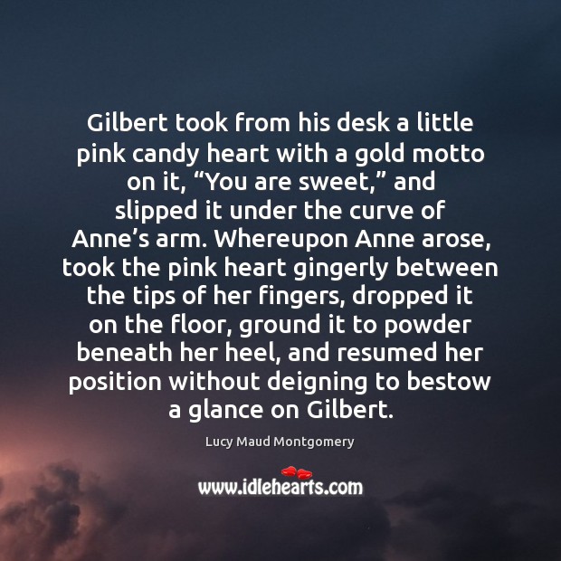 Gilbert took from his desk a little pink candy heart with a Lucy Maud Montgomery Picture Quote