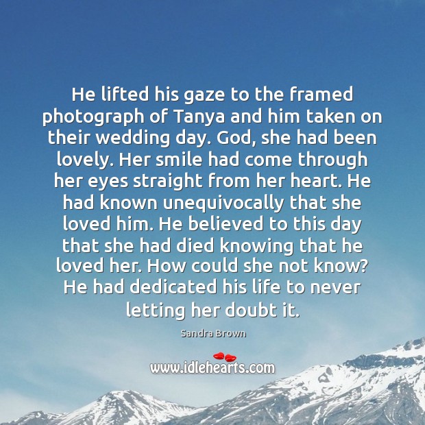 He lifted his gaze to the framed photograph of Tanya and him Sandra Brown Picture Quote