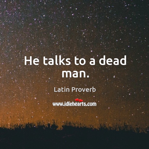 He talks to a dead man. Image