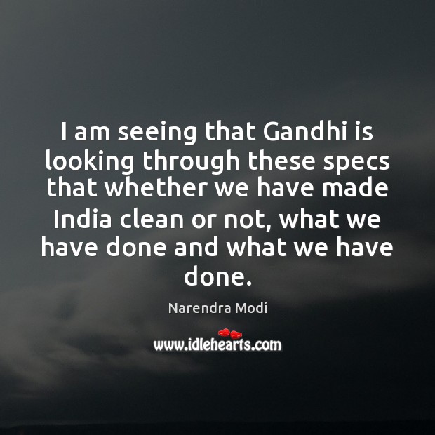 I am seeing that Gandhi is looking through these specs that whether Narendra Modi Picture Quote