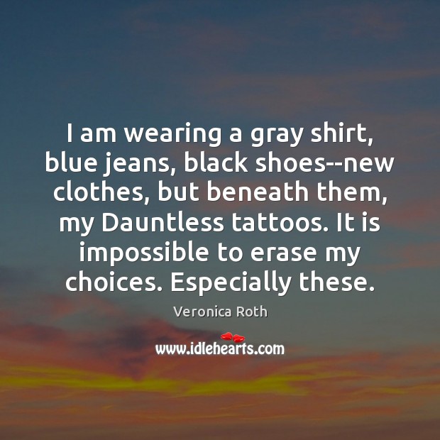 I am wearing a gray shirt, blue jeans, black shoes–new clothes, but Image