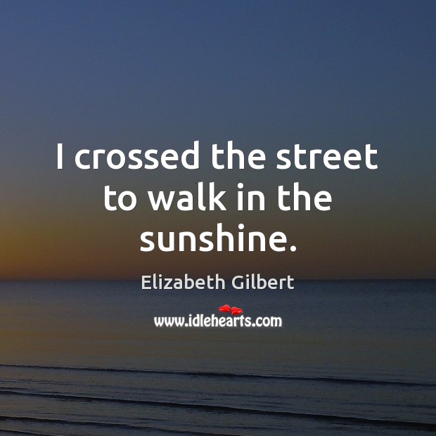 I crossed the street to walk in the sunshine. Image