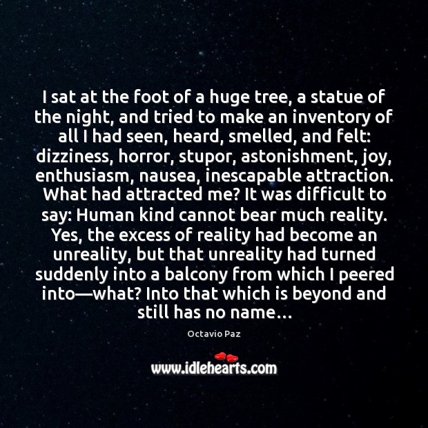 I sat at the foot of a huge tree, a statue of 