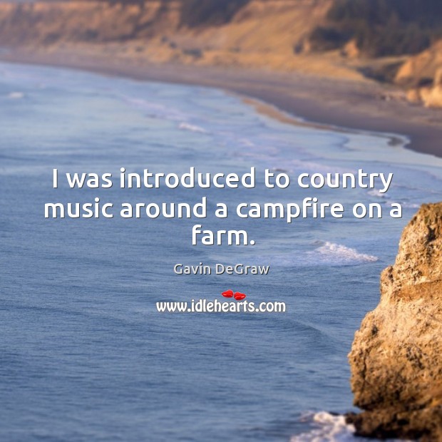 I was introduced to country music around a campfire on a farm. Image