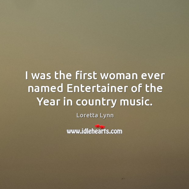 I was the first woman ever named entertainer of the year in country music. Image