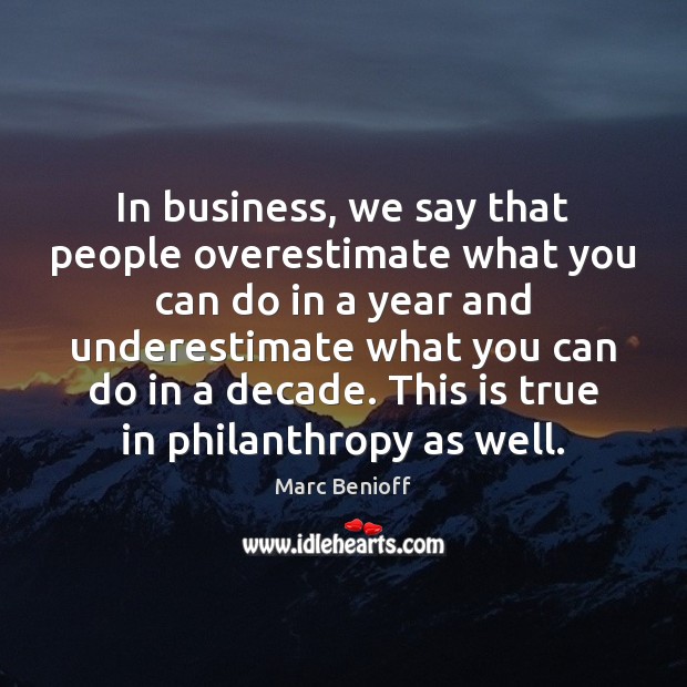 In business, we say that people overestimate what you can do in Marc Benioff Picture Quote