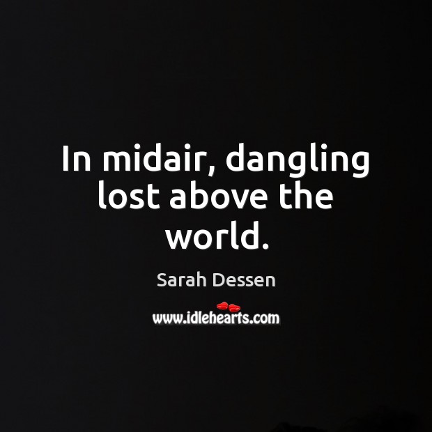 In midair, dangling lost above the world. Image