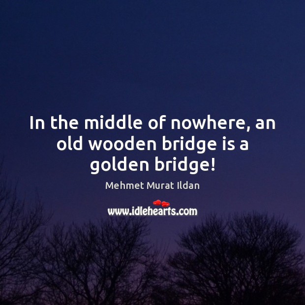 In the middle of nowhere, an old wooden bridge is a golden bridge! Image