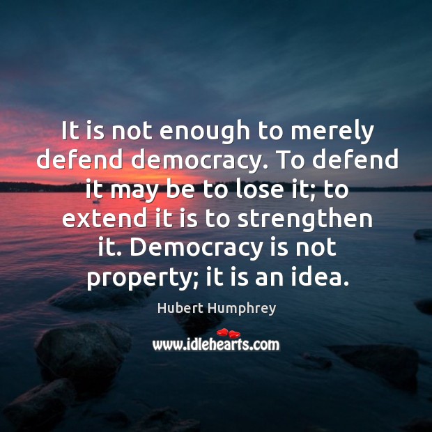 It is not enough to merely defend democracy. Hubert Humphrey Picture Quote