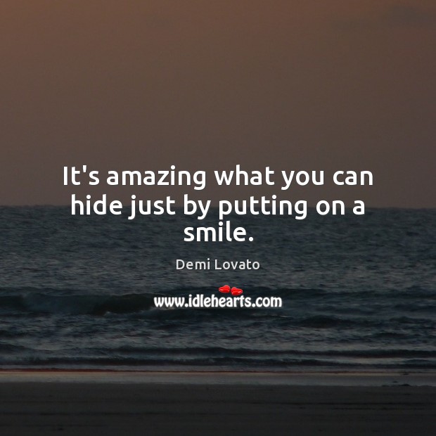 It’s amazing what you can hide just by putting on a smile. Image