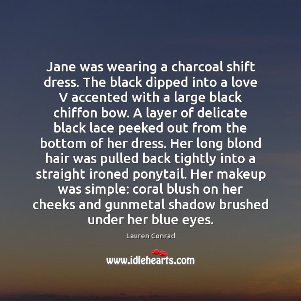 Jane was wearing a charcoal shift dress. The black dipped into a Image