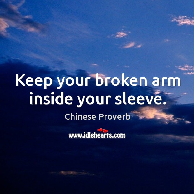 Keep your broken arm inside your sleeve. 