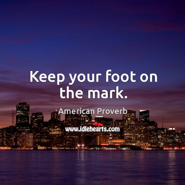 Keep your foot on the mark. Image