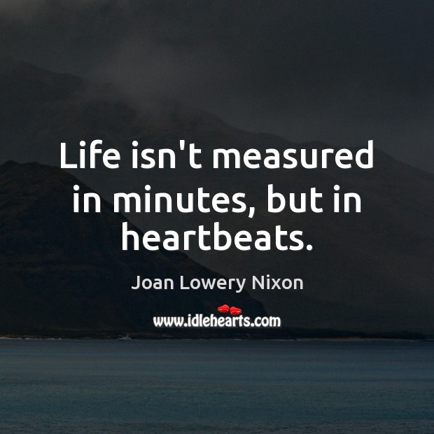 Life isn’t measured in minutes, but in heartbeats. Joan Lowery Nixon Picture Quote
