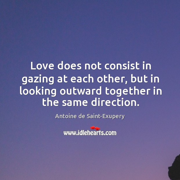 Love does not consist in gazing at each other Antoine de Saint-Exupery Picture Quote