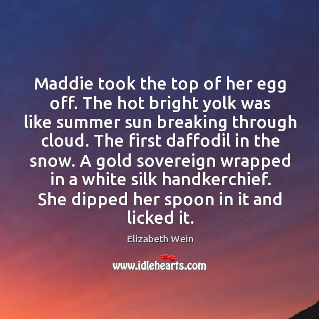 Maddie took the top of her egg off. The hot bright yolk Image
