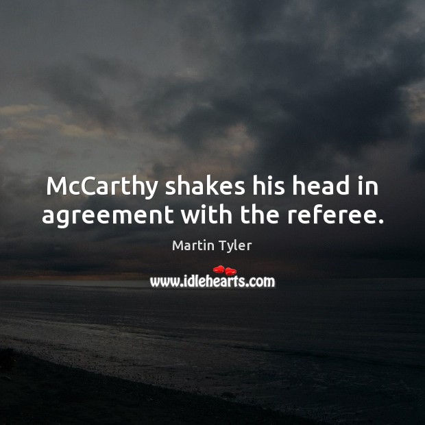McCarthy shakes his head in agreement with the referee. Image