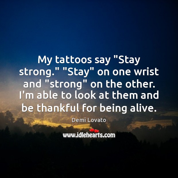 My tattoos say “Stay strong.” “Stay” on one wrist and “strong” on Image