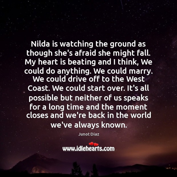 Nilda is watching the ground as though she’s afraid she might fall. Image