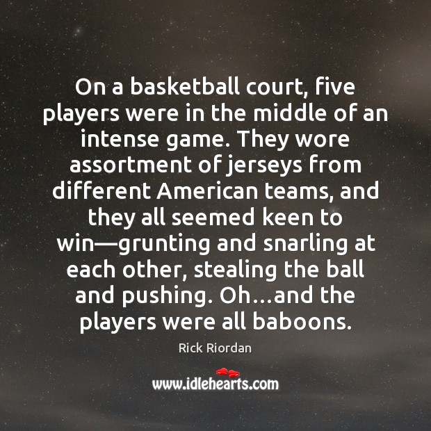 On a basketball court, five players were in the middle of an Image