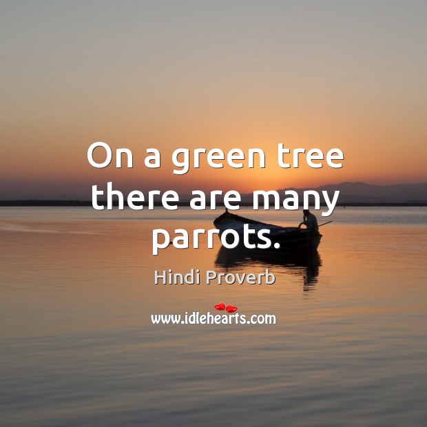 On a green tree there are many parrots. Hindi Proverbs Image