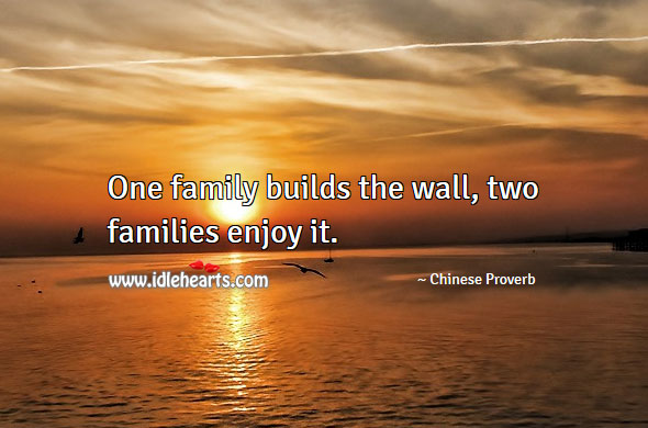 One family builds the wall, two families enjoy it. Image