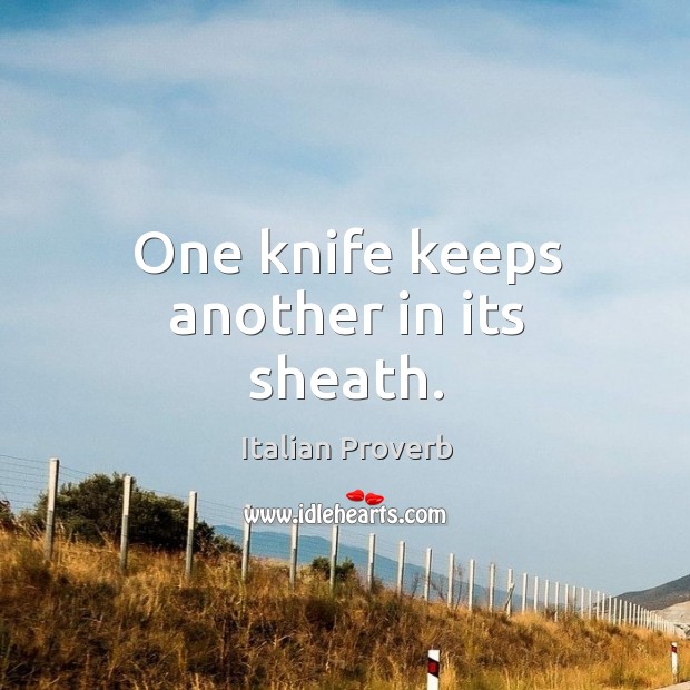 One knife keeps another in its sheath. Image