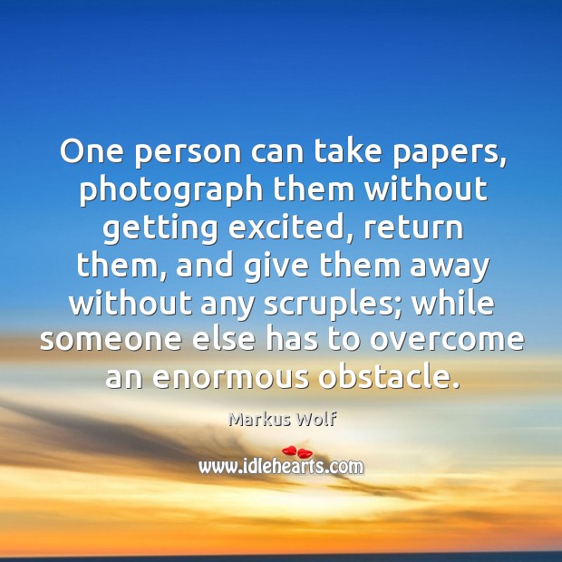 One person can take papers, photograph them without getting excited, return them Image